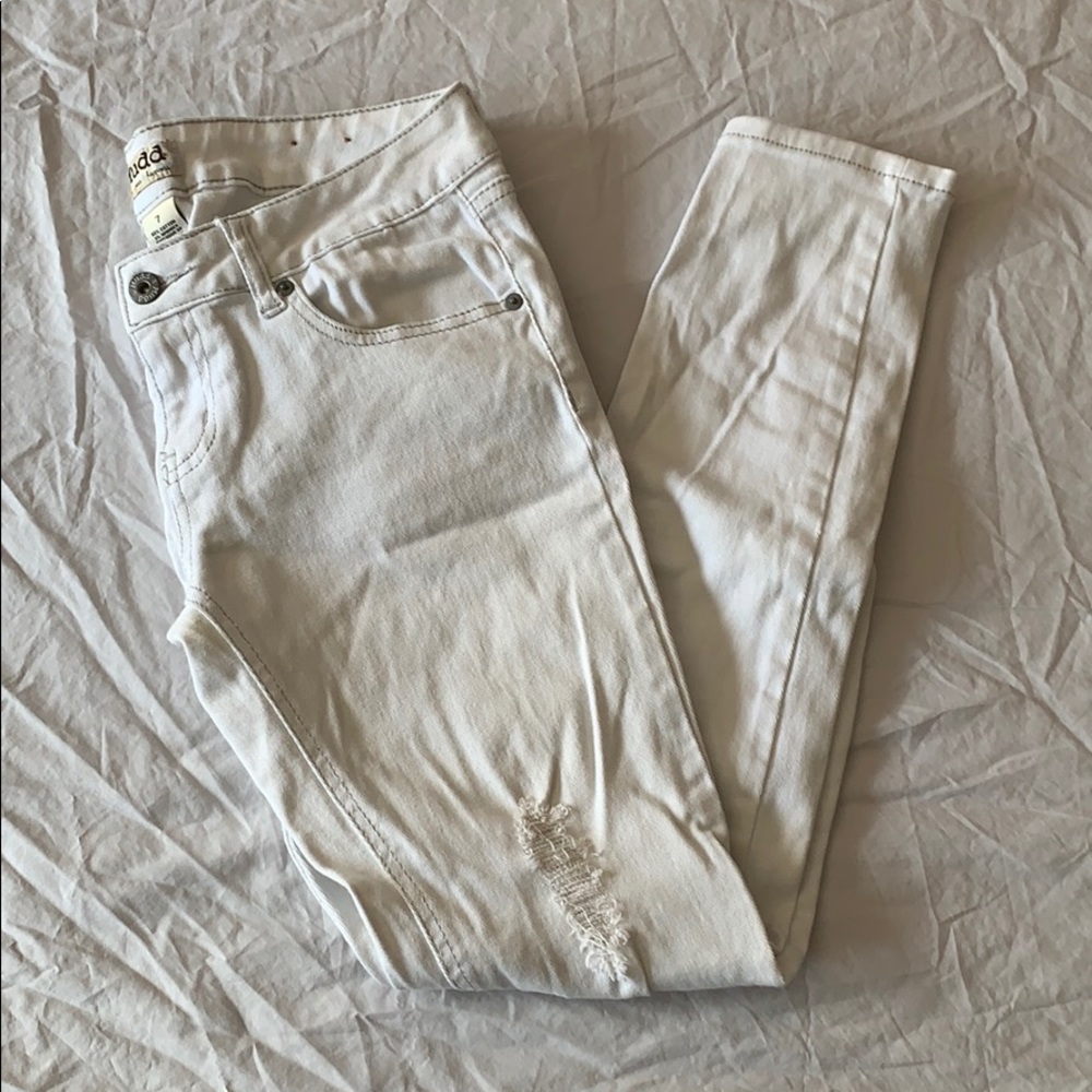 White ripped jeans